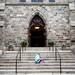 A girl rests on the stairs of a church on State Street during the Ann Arbor Marathon on Sunday, June 9. Daniel Brenner I AnnArbor.com